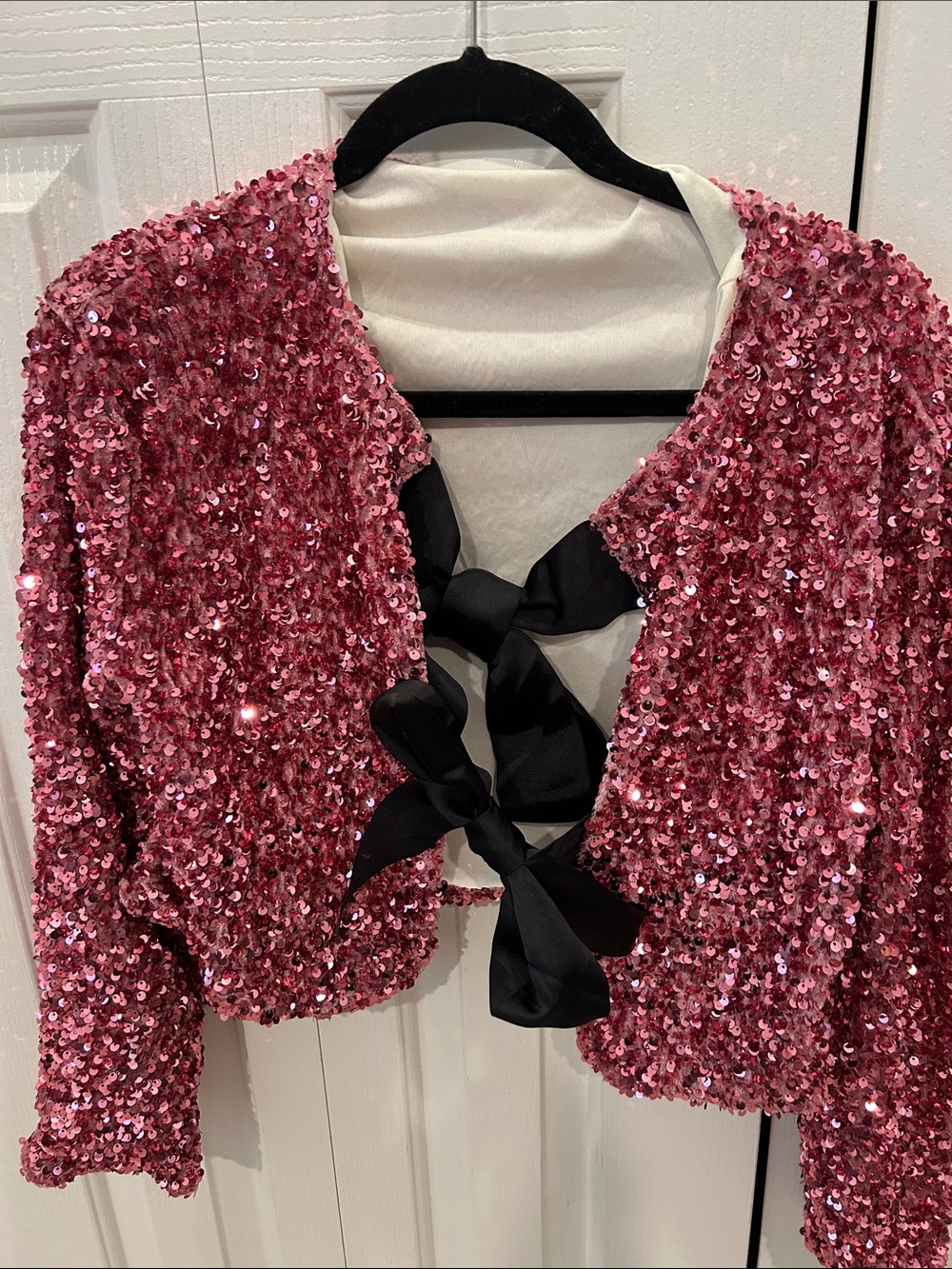 Pink Sequin Cropped Bomber Jacket with Black Bow Back